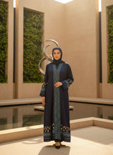 Elegant Grey Embroidered Open Abaya with Geometric Borders A0006 displayed in a modern outdoor setting.
