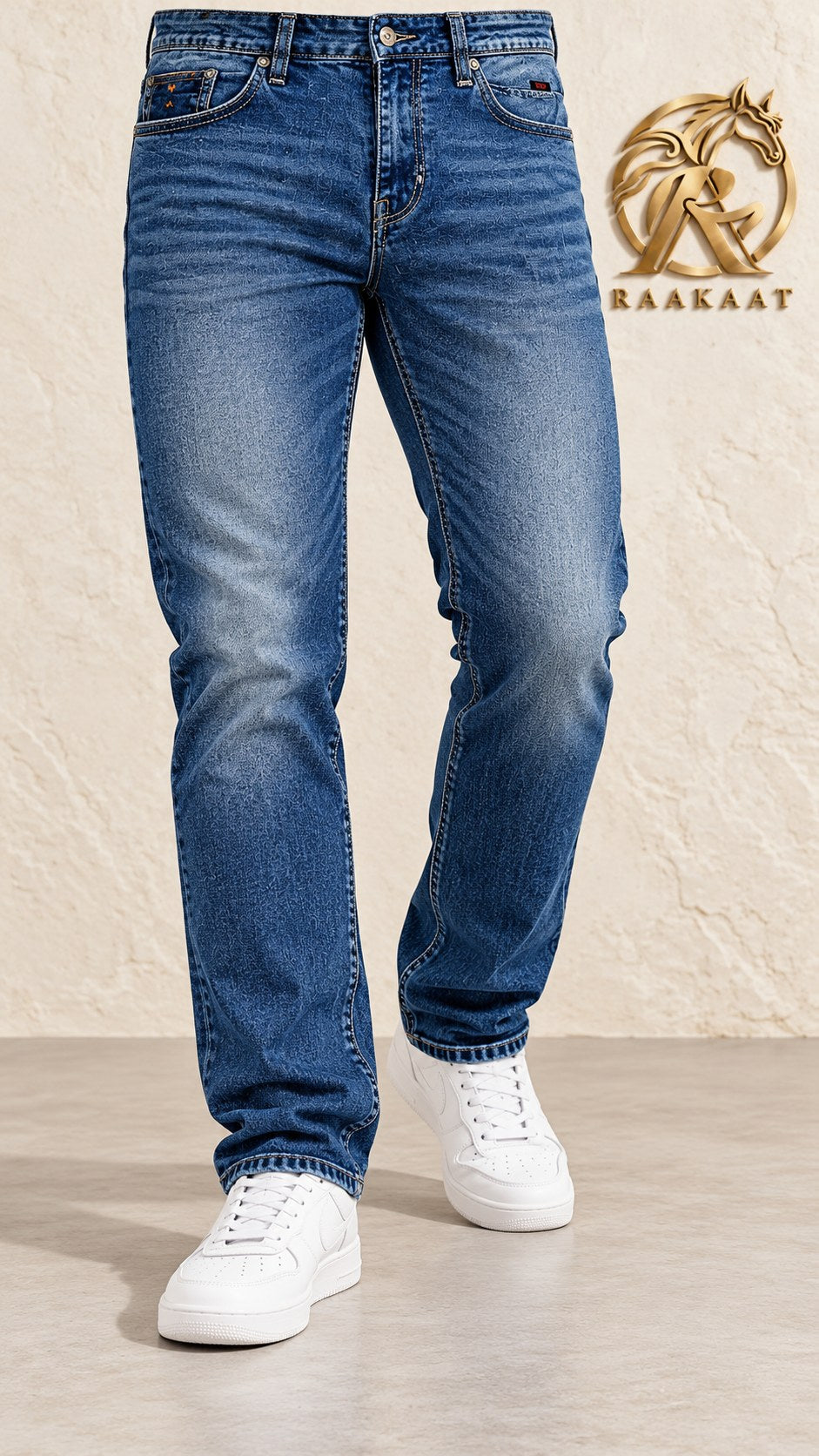 Raakaat men's mid blue whisker wash jeans – angle view