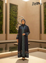 Elegant Grey Embroidered Open Abaya with Geometric Borders A0006 worn by a model in a stylish outdoor setting.