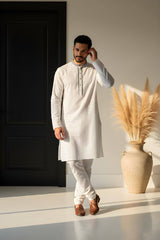 Ivory Noor – Minimalist Bangladeshi Panjabi P0004 model wearing elegant outfit in soft ivory tone with subtle detailing.