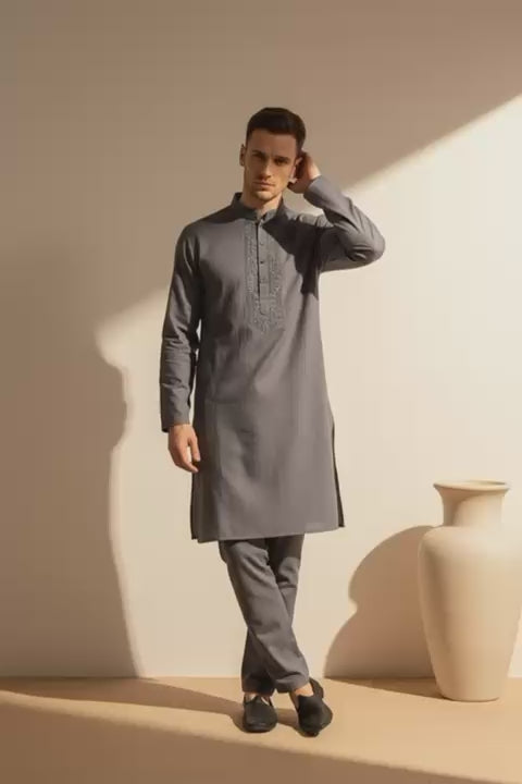 The Slate Heirloom | Hand-Embroidered Modern Panjabi P0006 worn by a man in charcoal slate with tonal embroidery.